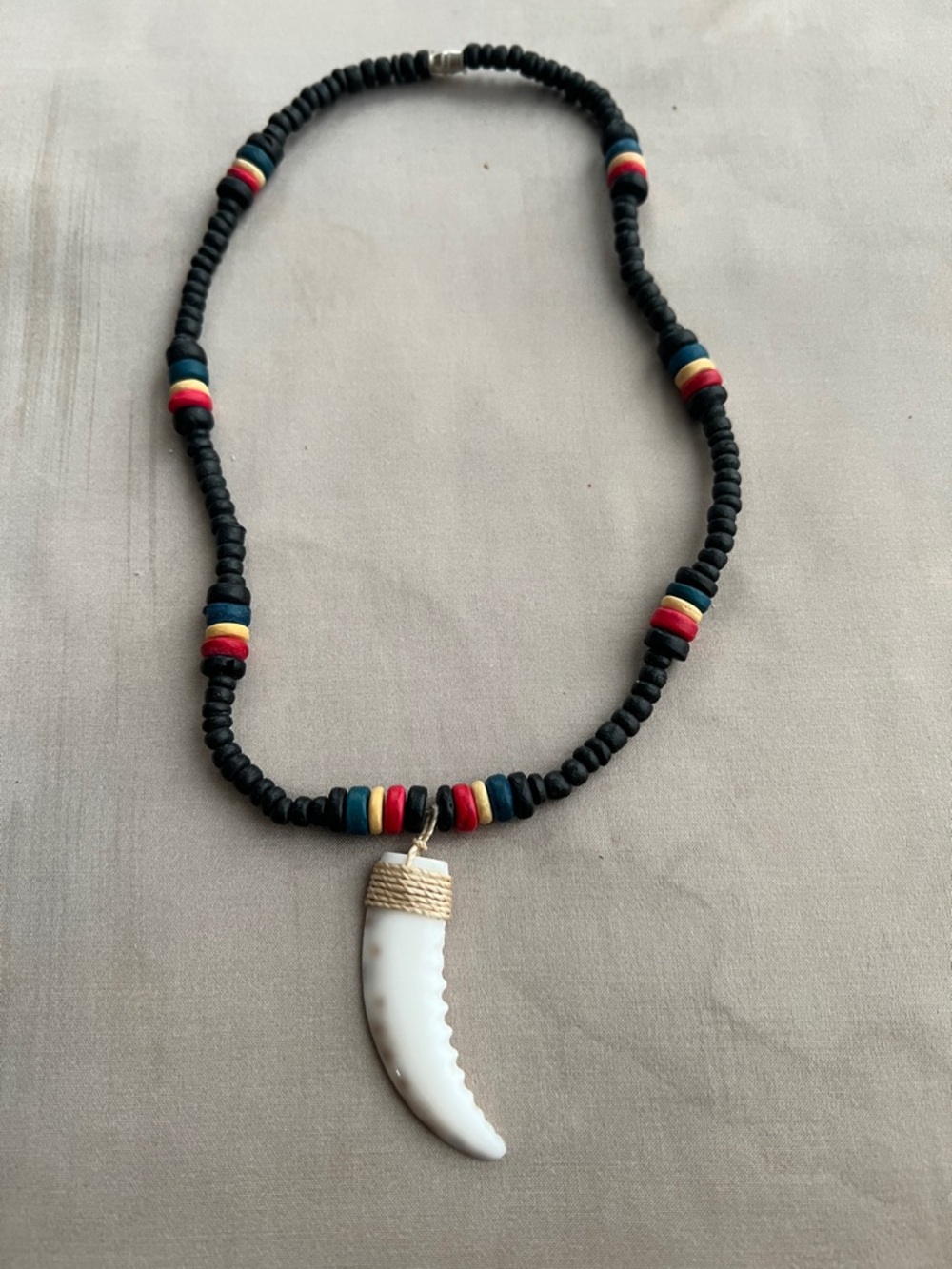 Unisex Black Beaded Necklace with White Tooth Pendant and Multicolor Accents